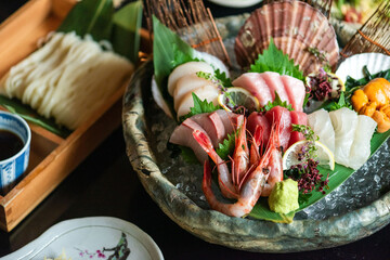 Obraz premium Fresh seafood platter with sashimi