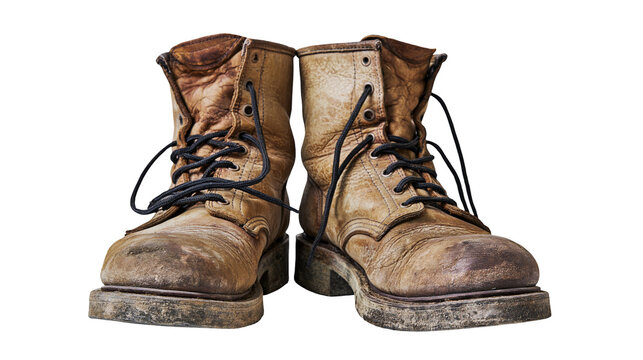 Worn brown leather work boots with black laces