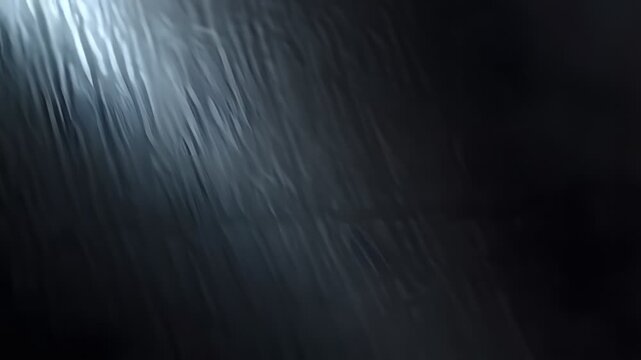 Abstract dark textured background with light reflections
