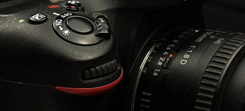 Macro shot of a digital camera shutter button and power switch 