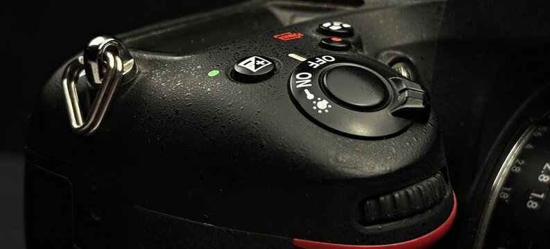 Macro shot of a digital camera shutter button and power switch 
