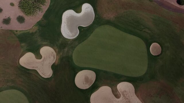 A HD aerial view of a desert golf course located in southeastern Arizona in the summer.