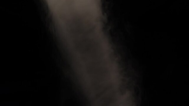 rotating white smoke on a black background, creating elegant swirling patterns and atmospheric motion. Abstract smoke movement with soft textures, flowing shapes, and dramatic contrast