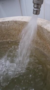 water flowing from the water pipe