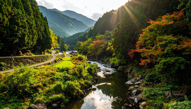 新緑が美しい里山の清流と山々の風景