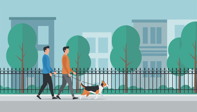 Two young men walking their beagle dog on a leash along a city park pathway with trees and buildings in the background.