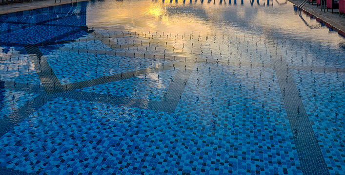 Serene swimming pool captured during golden hour
