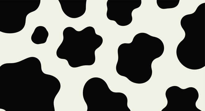Seamless black and white cow print pattern with organic irregular spots.