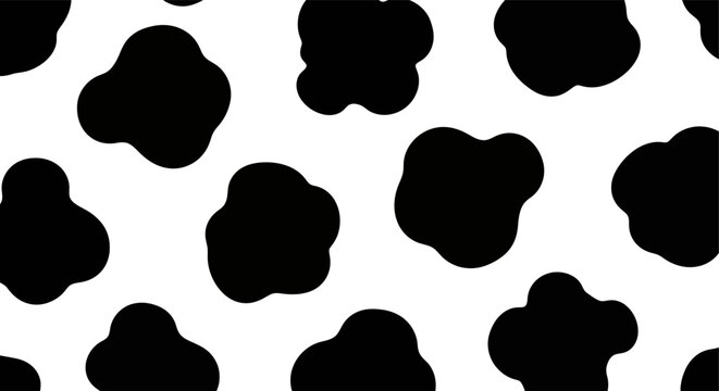 Seamless black and white cow print pattern with organic animal spots.