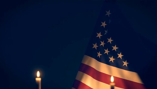 American flag waving proudly on fourth of July celebrating independence at night with candles