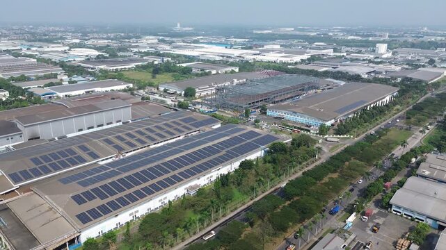 Cikarang, Indonesia - June 18, 2026: Aerial view of industrial warehouses with rooftop solar panels in the Cikarang manufacturing district