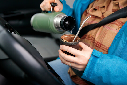 Pouring water for mate beverage
