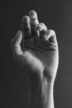 Hand in hand gesture showing creativity 