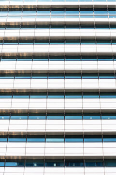 Modern Teal Glass Window Building Facade with Geometric lines