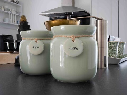 coffee and sugar storage jars in olive glazed pottery country style