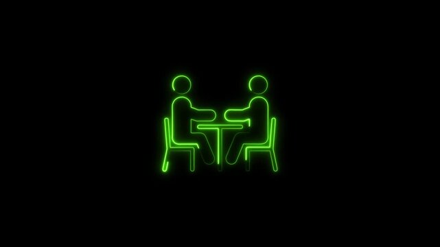 Green neon light outline of two people sitting opposite at a table a glowing line drawing showing simplified human figures across from each other at a small glowing meeting discussion communication