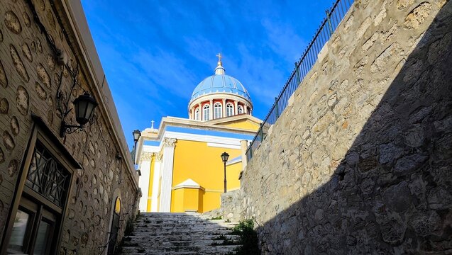 Low-angle view of the magnificent neoclassical Church of Agios Nikolaos (Saint Nicholas) in the historic Vaporia district of Ermoupoli on Syros Island, Cyclades, Greece. 