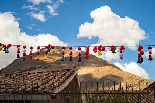 Colorful pompom strings in Ollantaytambo in the Sacred Valley near Cusco in Peru.