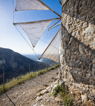 Restored old windmill on the Lasithi High Plateau at Seli Ambelou on the island Crete, Greece