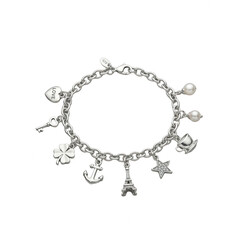 Fototapeta premium Silver charm bracelet with assorted symbols on black background