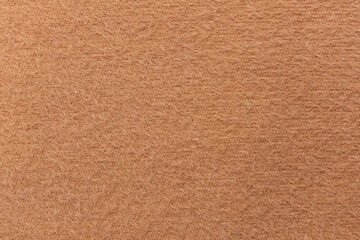 Fototapeta premium Fluffy beige cotton fabric texture for design and creative projects with space for text and graphics to showcase content clearly