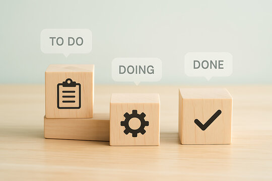 Wooden blocks representing to do doing and done tasks with icons displayed