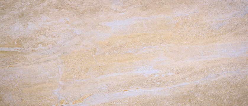 Warm beige stone texture dominates this surface. Light streaks flow across the material's slightly rough finish. Natural variations create subtle tonal shifts throughout the frame