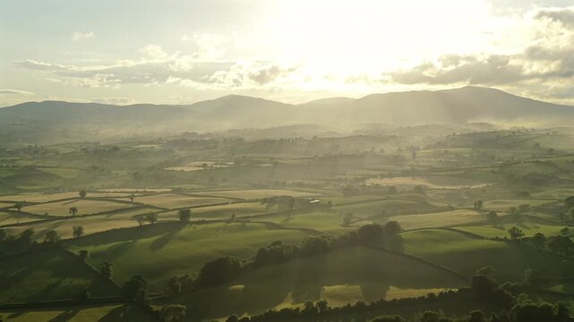 Aerial view of fields and rolling hills during sunset county Down Northern Ireland