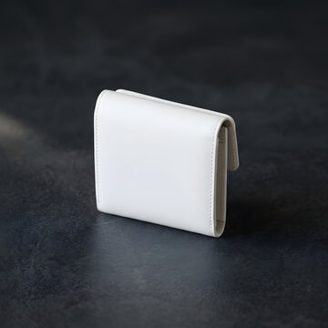 White modern minimalist rectangular box with handle.