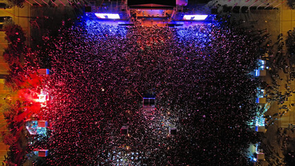 Aerial top view of crowd people at night music concert © Kokhanchikov