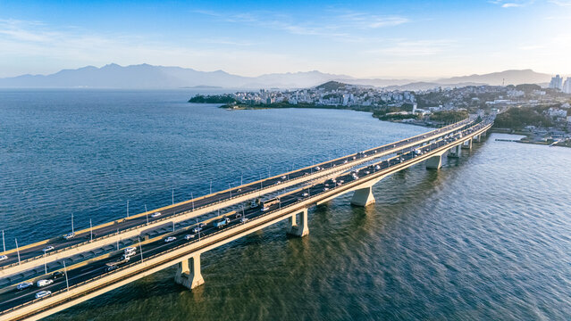 Aerial View of Pedro Ivo Campos and Colombo Salles Bridges with City Traffic and Ocean Coastline in Florianopolis Santa Catarina Brazil