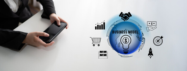 Modern Business Model Concept with Digital Technology, Financial Growth, and Global Collaboration Visualized Through Icons and Handheld Device Quark. © InfiniteFlow