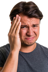 Fototapeta premium Young male holding his forehead with a troubled expression, stress and headache symptom isolated on transparent background 