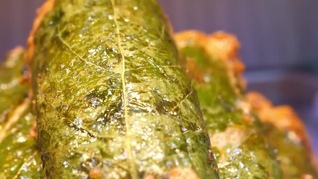 A detailed close-up shot of authentic Korean fish cakes also known as eomuk or odeng. The footage showcases the crispy golden-brown texture and savory appearance of these traditional street food snack