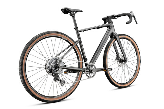 Gravel bicycle with dark frame isolated on white background. Backside view. Studio shot