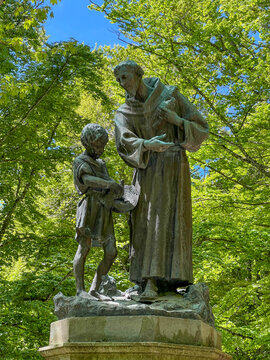 A statue of St. Francis among the trees, near the Franciscan monastery in La Verna, Italy, at the site where St. Francis received the stigmata.