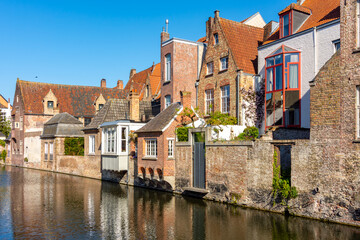 Obraz premium Canals and medieval architecture of old Brugge, Belgium