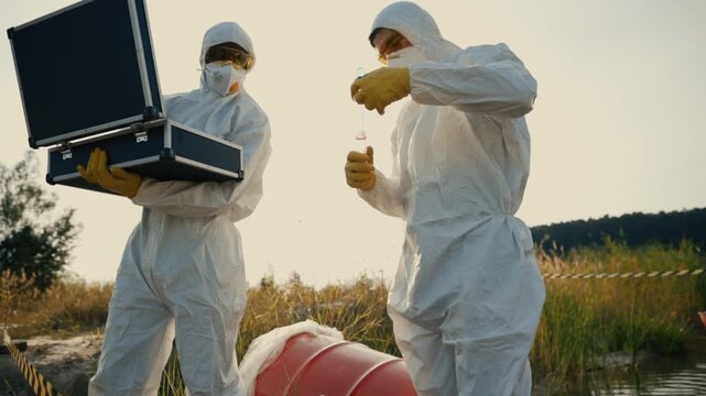 The Hazmat Crew is diligently collecting crucial samples in an outdoor environment for analysis