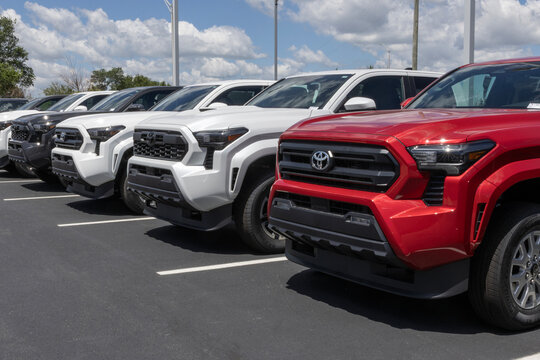 Toyota Tacoma display. Toyota offers the Tacoma in SR, SR5, several TRD levels, Limited, and Trailhunter models. MY:2026