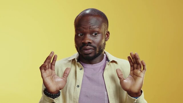 A bearded man delivers a comedic act, showcasing funny expressions