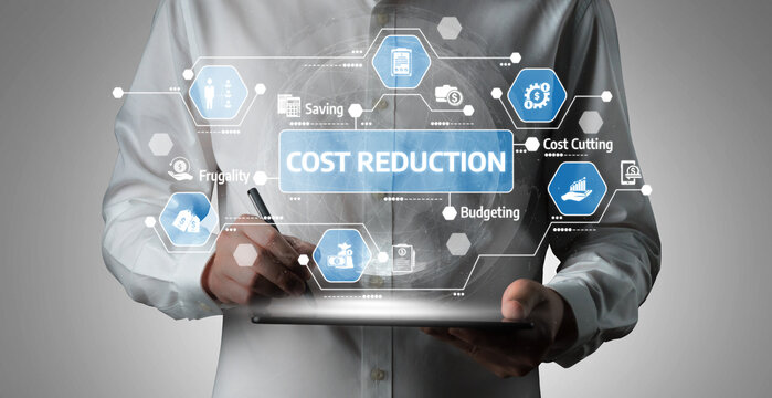 A businessman stands with a tablet, showcasing graphic elements related to cost reduction and financial management. This image conveys modern strategies for efficiency and growth. Tessel