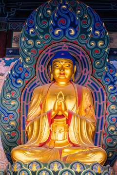 Datong, China - May 9 2026: Ancient Buddhist sculpture in Huayan Temple, expressing spiritual serenity, exquisite craftsmanship, and the legacy of Chinese Buddhist art