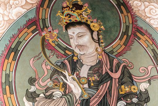 Datong, China - May 9 2026: Vivid Buddhist mural paintings in Huayan Temple showcasing intricate iconography, flowing lines, and rich colors reflecting Liao and Jin dynasty religious artistry