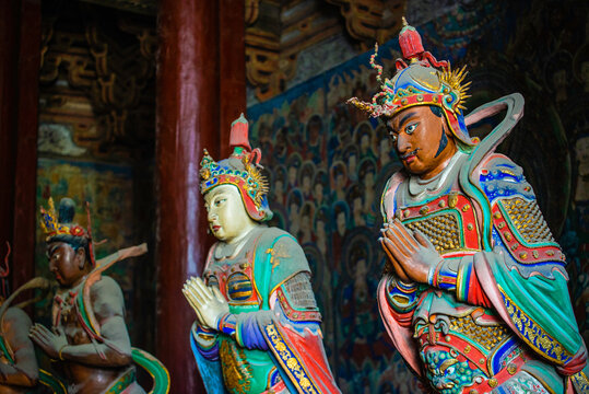 Datong, China - May 9 2026: Ancient Buddhist sculpture in Huayan Temple, expressing spiritual serenity, exquisite craftsmanship, and the legacy of Chinese Buddhist art