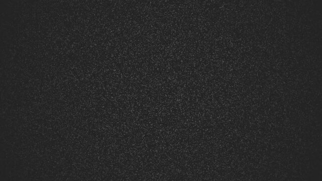 Noise filter for tv damage and flashing light create a grainy black television static monochromatic background. Perfect for eerie, retro, or glitchy design projects.