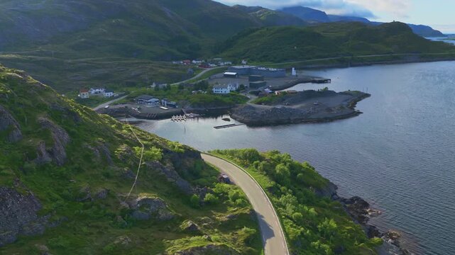 Aerial drone view of Lofoten Islands fishing village with coastal road