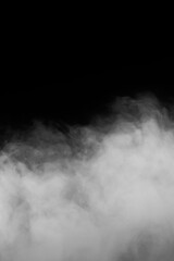 Fototapeta premium White smoke or fog isolated on black background with large copy space.