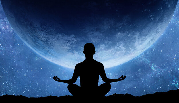 Silhouette of human sitting on stars and planet background. Yoga pose. Meditation in yoga. Psychology and relax. Nightly starry space landscape. Success and motivation. Lifestyle and freedom concept.