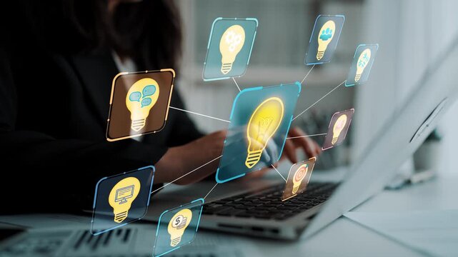 Creative Idea Generation Concept with Light Bulb Icons Connected by Lines Representing Innovative Thinking and Technology on Laptop. Entropy.