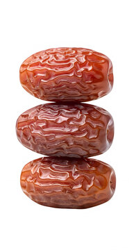 Three dried dates stacked neatly